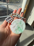 Jade necklace with carved pendant